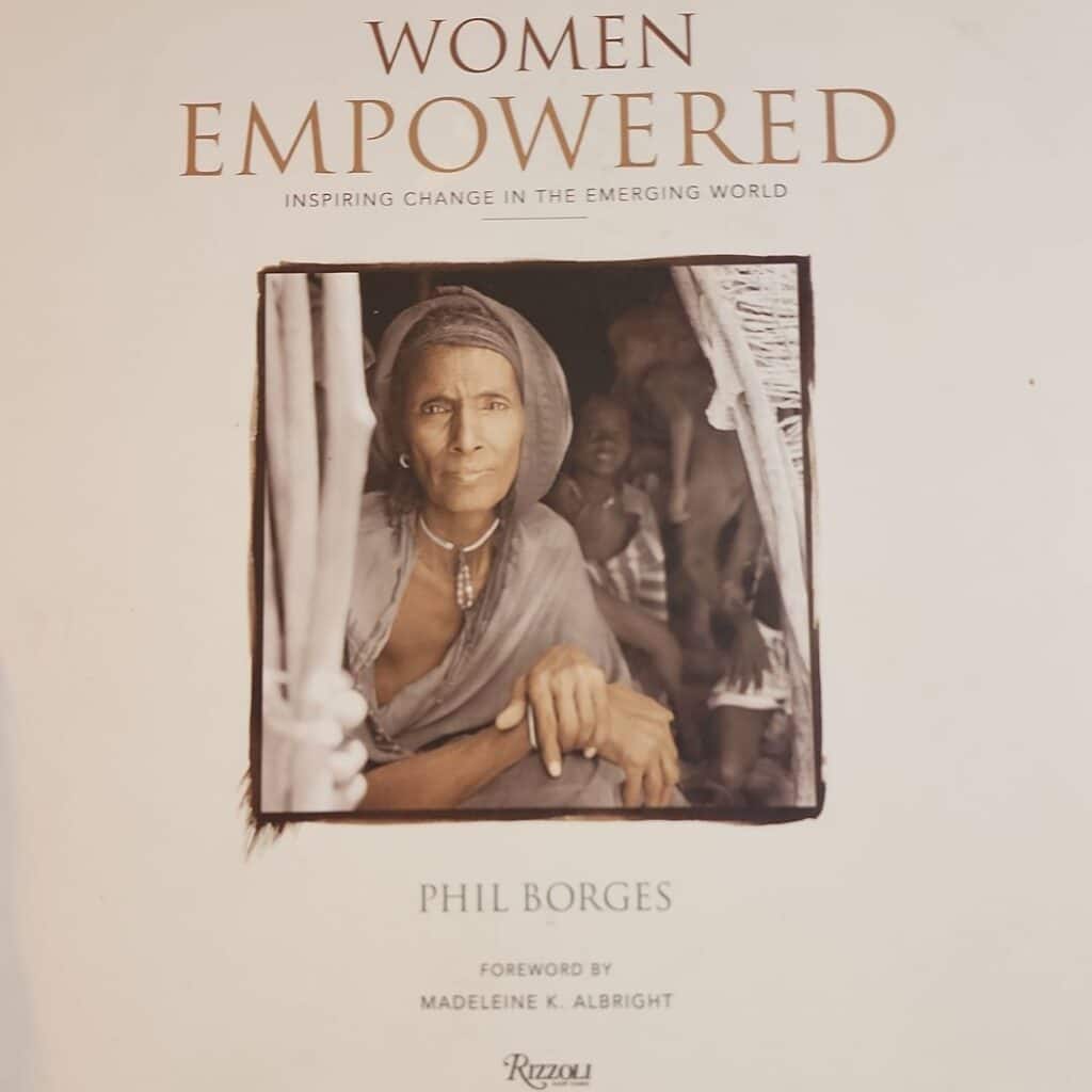 Cover of Women Empowered by Phil Borges, featuring a portrait of a woman — part of a book drop social experiment leaving books for strangers to find.